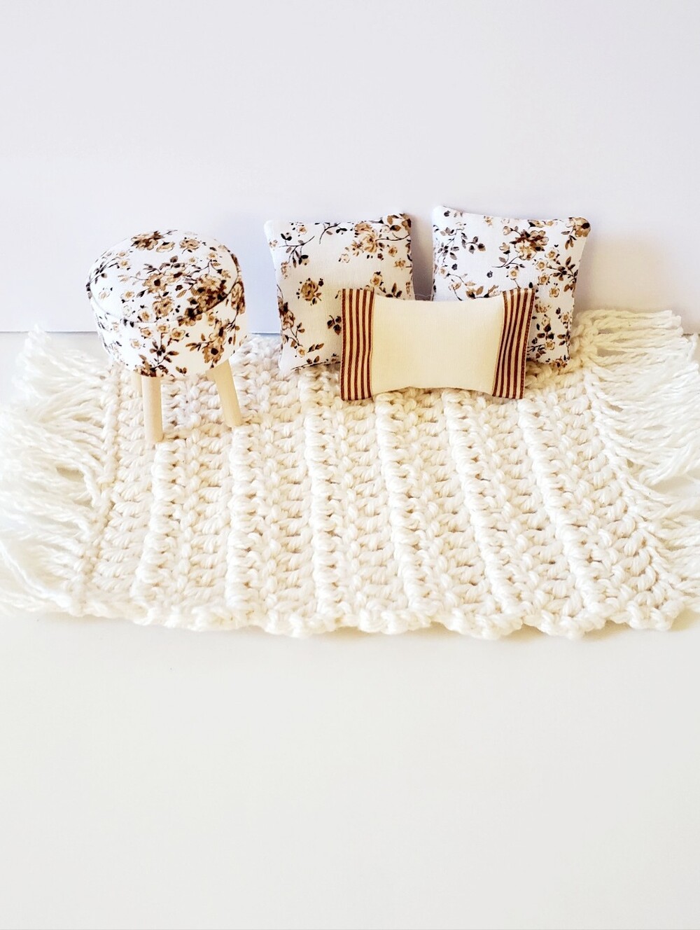 Miniature Dollhouse Cream Hand-Knit Rug with Floral Accent Pillows Maileg